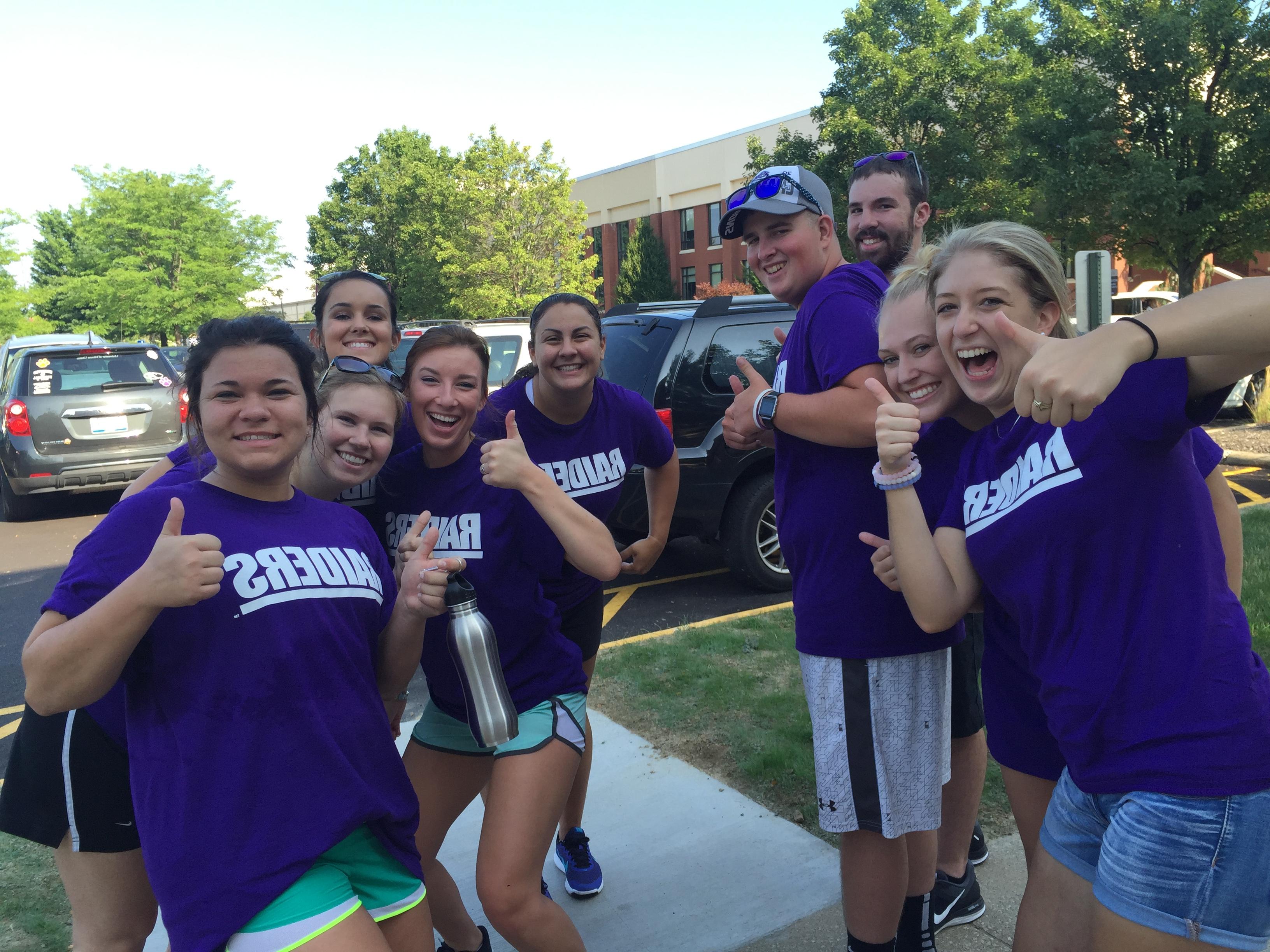 student group giving thumbs up